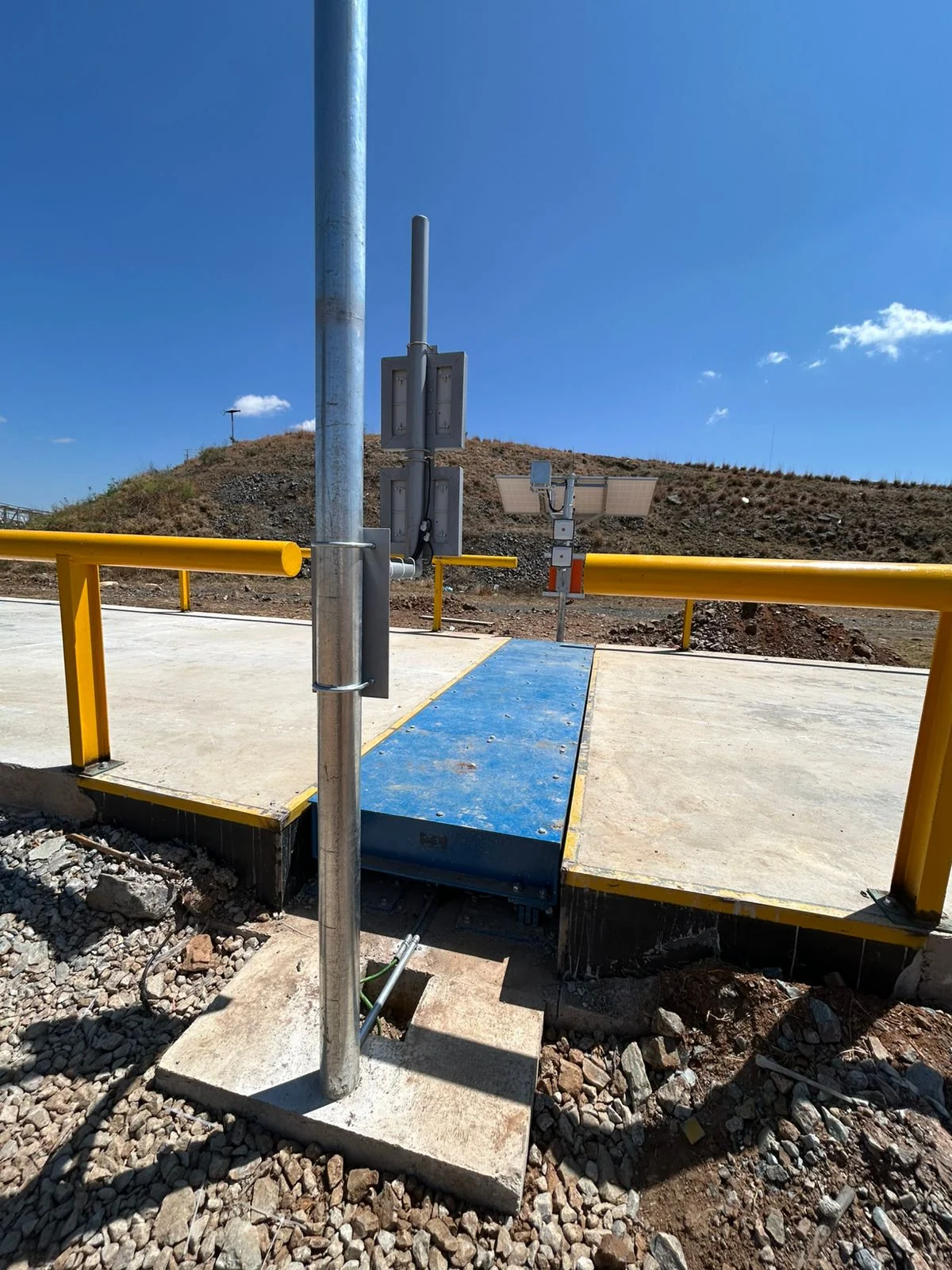 In-Motion Weighbridge installation showing truck passing over the scale at operating speed